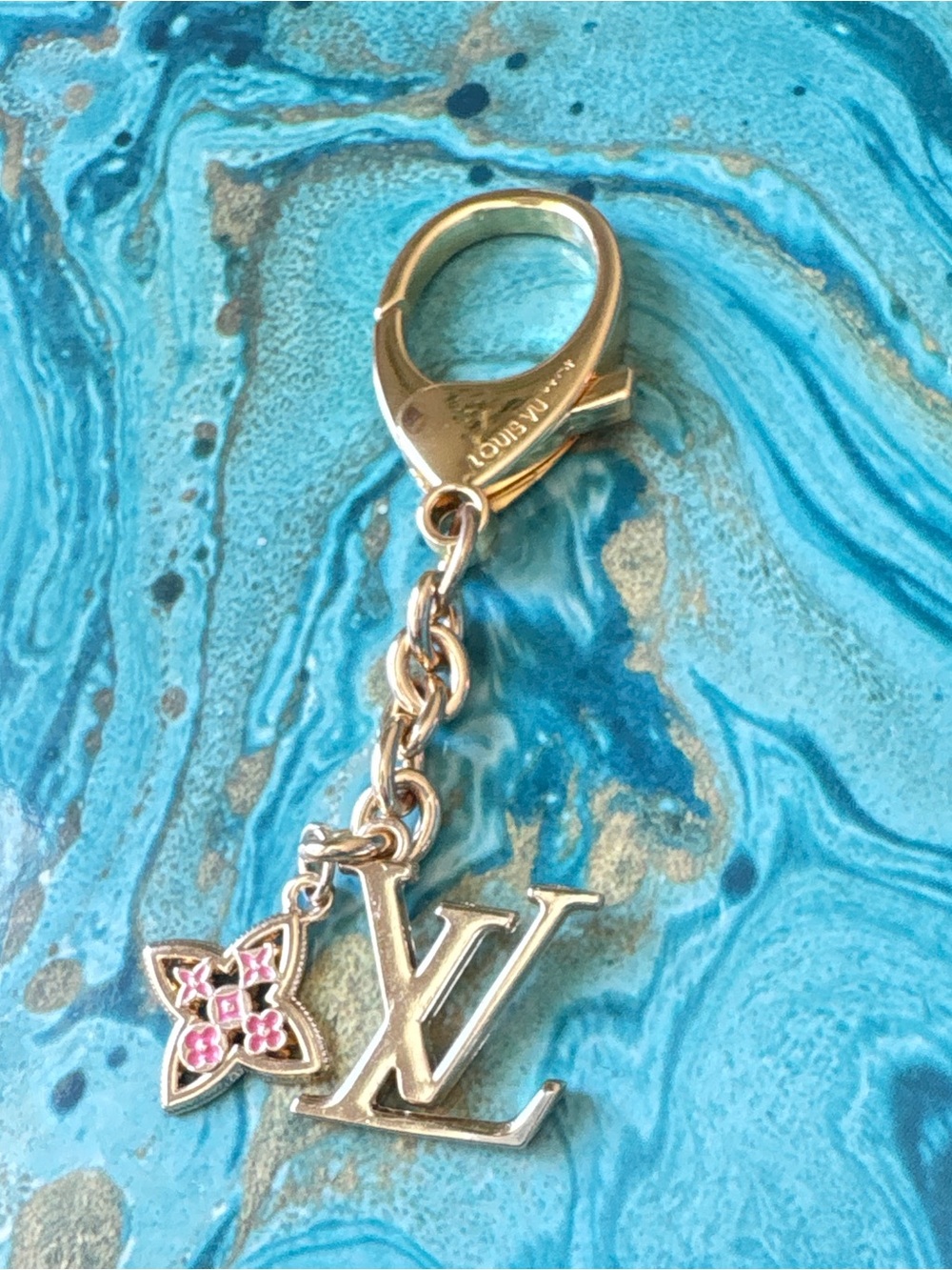 Louis Vuitton Gold Tone LV Logo Keychain with Pink Floral Charm